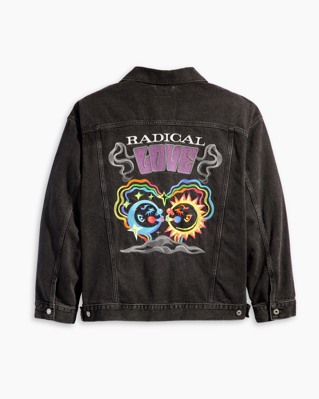 Back of the Levi’s Pride Liberation Trucker Jacket in black with the words “Radical Love” written over a graphic of two orbs kissing